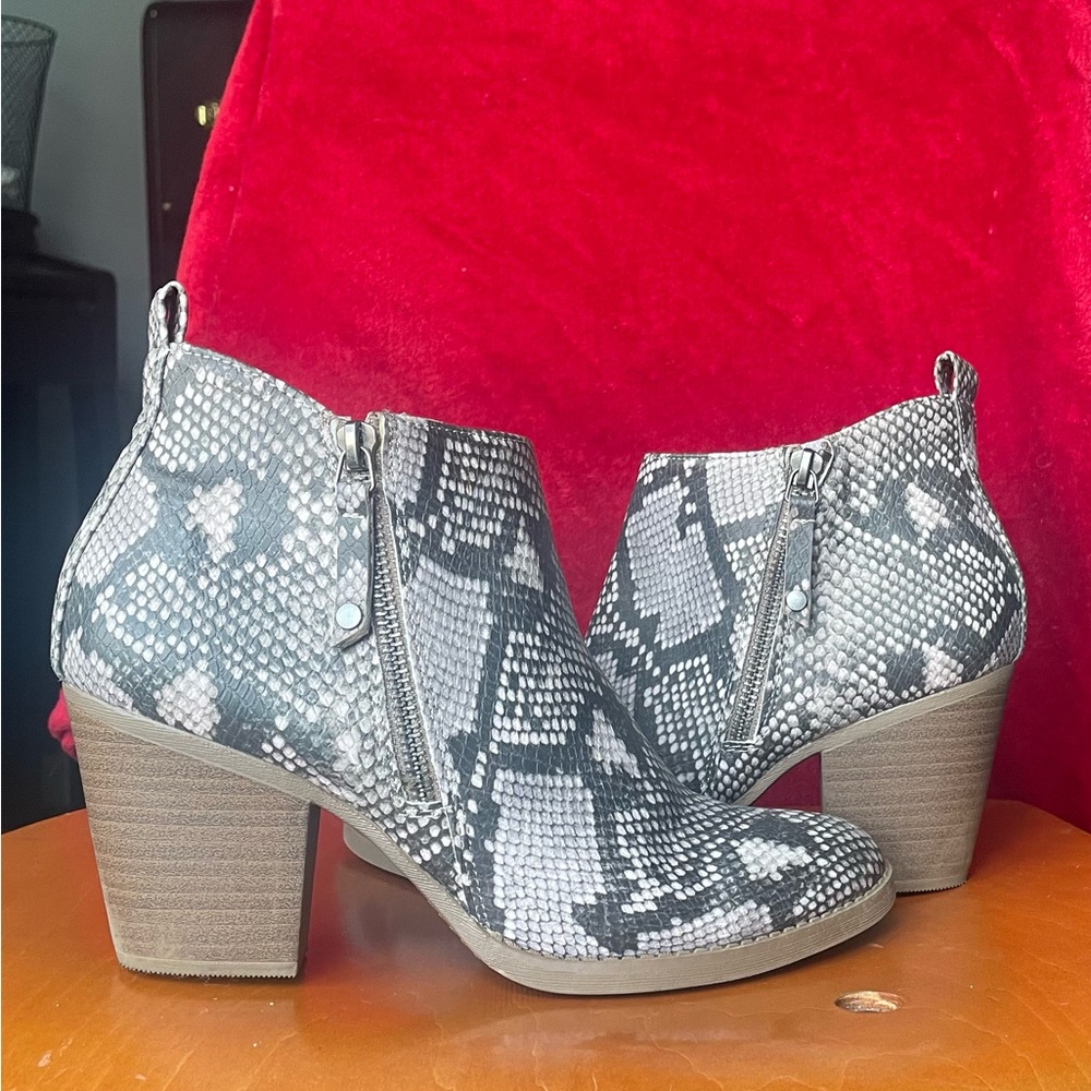 Snakeskin heeled boots